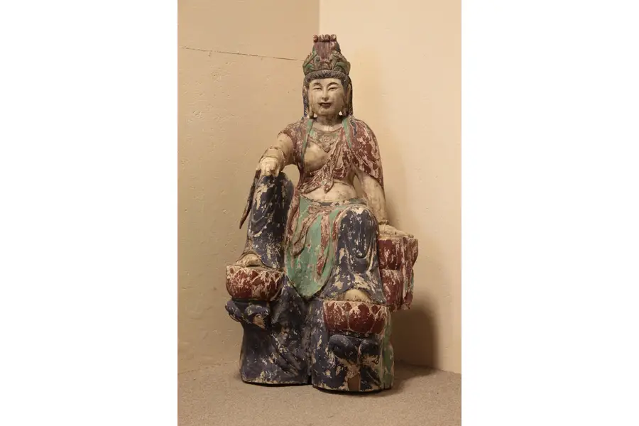 Photo of Thai Temple Wood Sculpture of Divinity on Pedestal