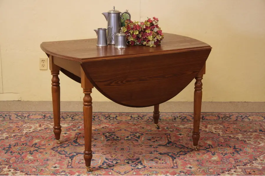 Photo of Victorian Oval Oak Antique Dropleaf Table