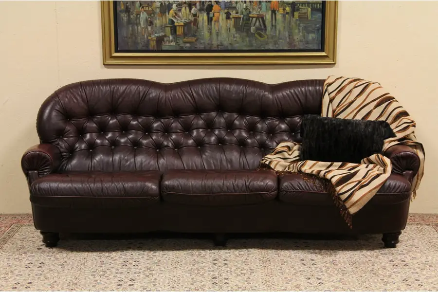 Photo of Tufted Leather Vintage Three Cushion Sofa