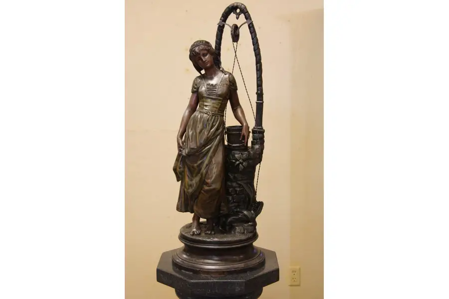 Photo of Young Woman at the Well, Ple Sculpture