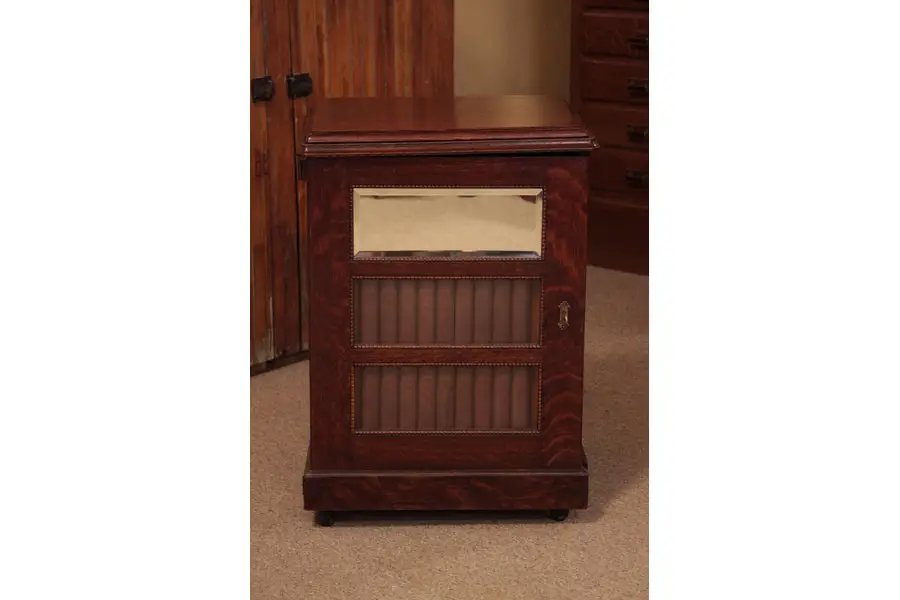 Photo of Oak 1900 Sewing Cabinet, Leather Books, Mirror