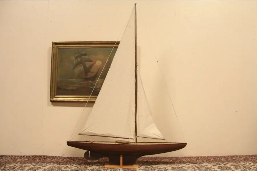 Photo of Model Sailboat with Rigging and Stand