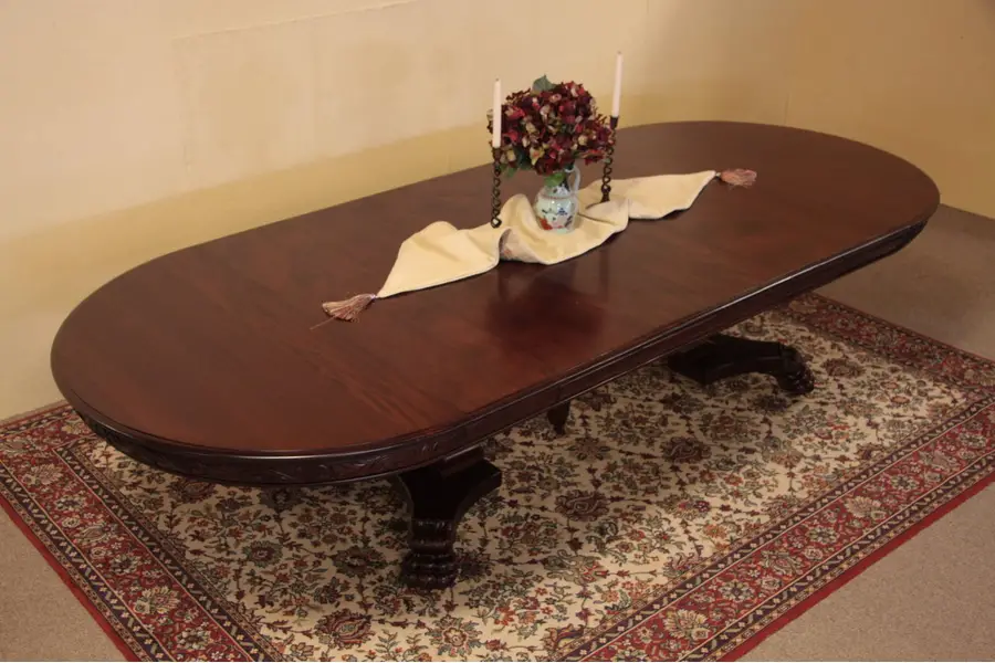 Photo of Round Mahogany Lion Paw Dining Table, Extends 10'7"