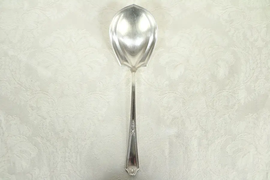 Photo of Sterling Silver Shell Shape Antique Serving Spoon, signed JS & Co, Pat