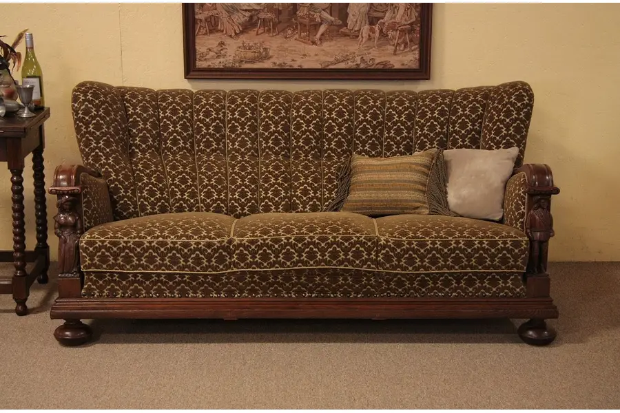 Photo of Antique Oak Sofa with Carved Figures