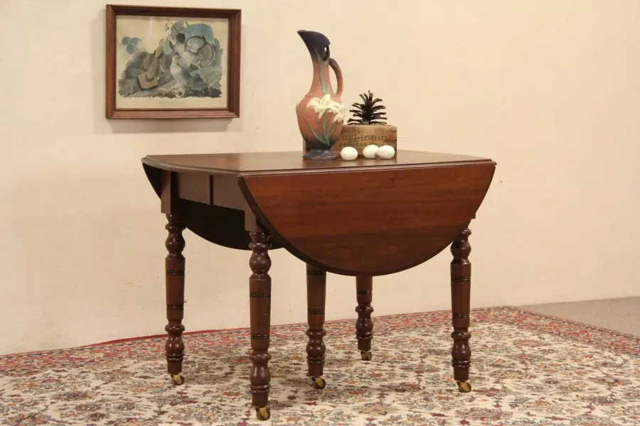 Photo of Victorian 1885 Antique Oval Walnut Dropleaf Dining Table, 6 Leaves