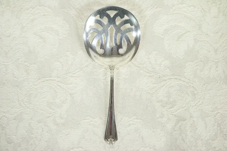 Photo of Sterling Silver Slotted Serving Spoon, Hallmark Pat. 1913