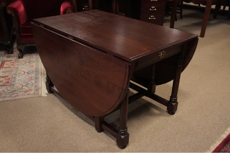 Photo of Oval Quartersawn Oak 4 by6 1/2' Gateleg Dining Table