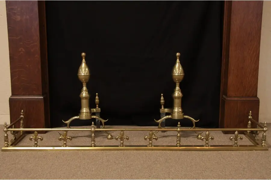 Photo of Fleur de Lis Antique Brass Fireplace Fender