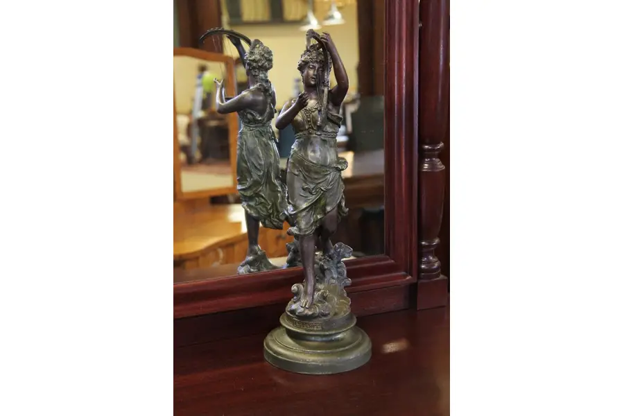 Photo of Muse of Music Euterpe Playing Harp Statue