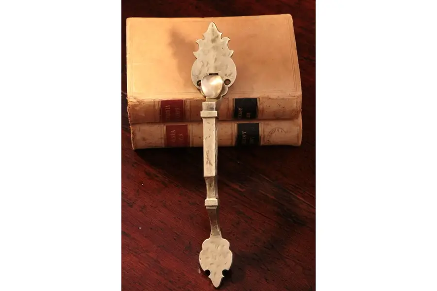 Photo of Russwin Kent Antique Brass Door Handle