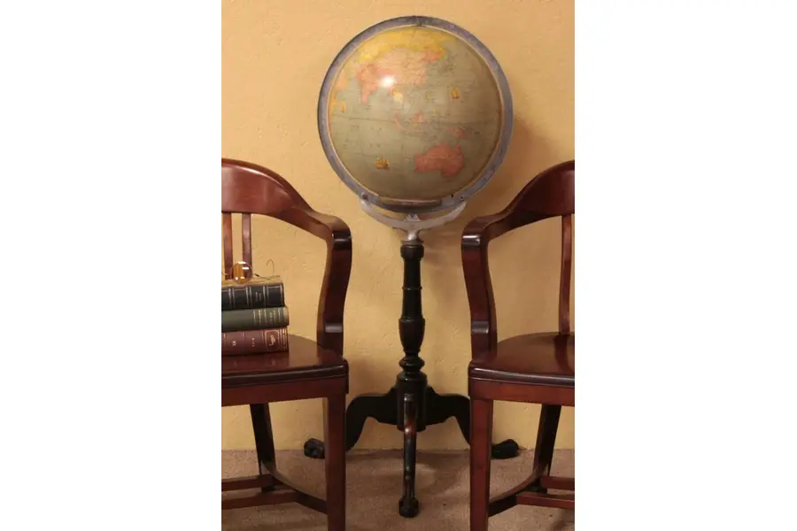 Photo of Lighted Glass Globe on Mahogany Pedestal