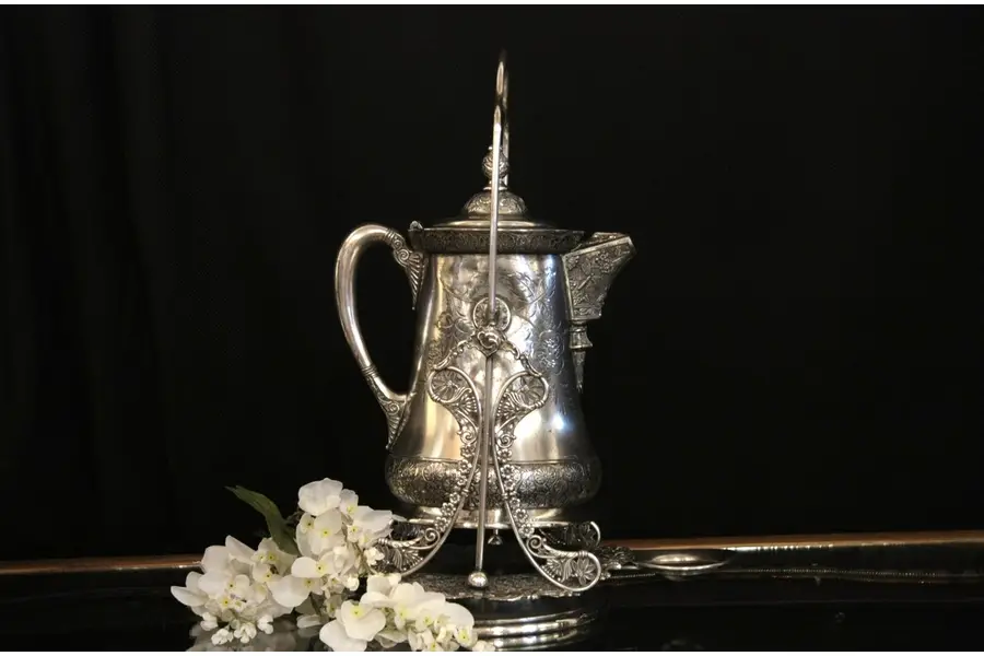 Photo of Victorian Silverplate Antique Tilting Pitcher