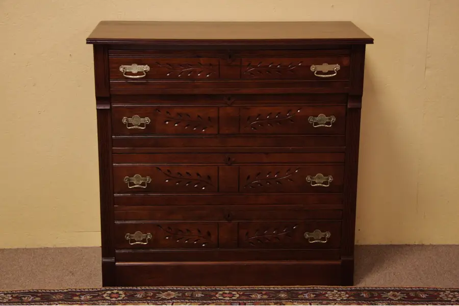Photo of Victorian Eastlake Walnut Spoon-carved Chest Dresser