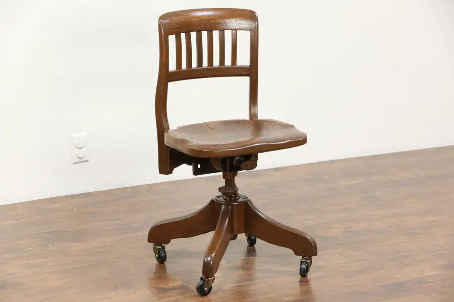 Photo of Oak 1925 Antique Swivel Adjustable Desk Chair, Signed Revells Chicago