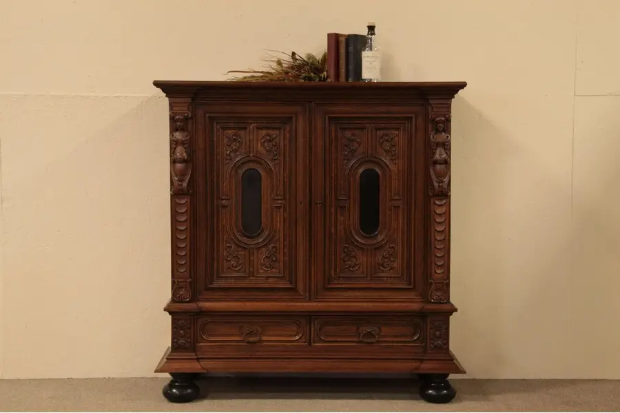 Photo of Antique Oak Cabinet with Hand Carved Figures