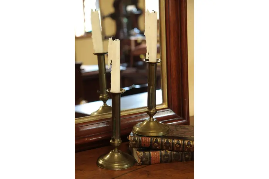 Photo of Pair of Antique Brass Push-up Chamber Candlesticks