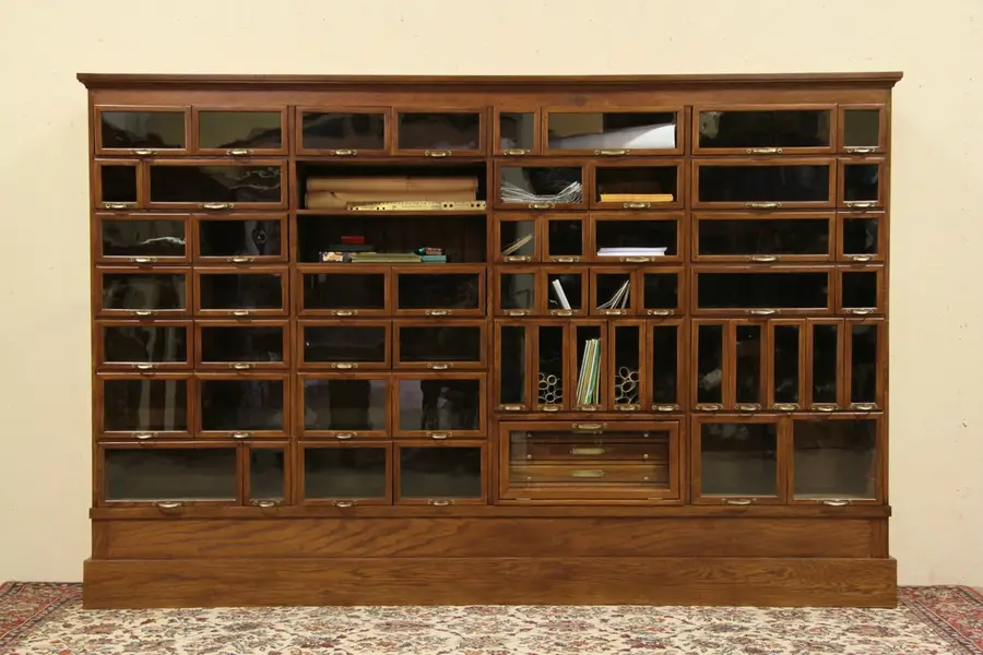 Photo of Oak Antique 1900 Cabinet, 58 Glass Front Drawers