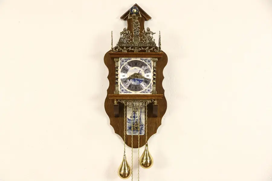 Photo of Dutch Vintage Wall Clock, Blue Delft Tiles & Atlas Figure, Signed Alma & Hermle