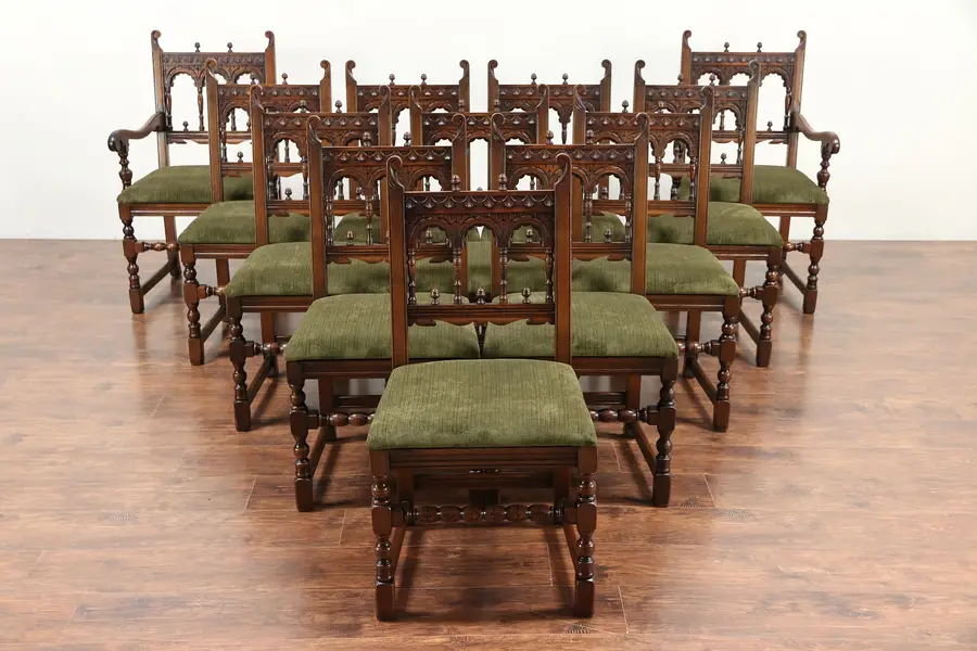 Photo of Set of 12 English Tudor Antique Carved Oak Dining Chairs, New Upholstery