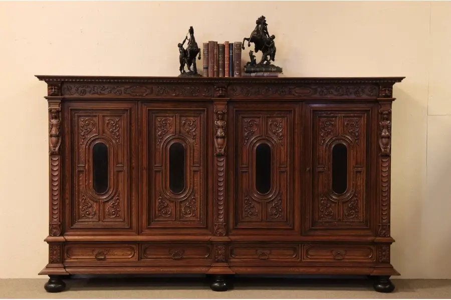 Photo of Solid Oak Antique 8' Cabinet with Carved Figures