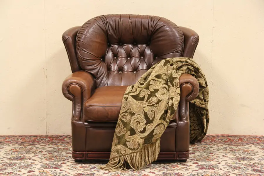 Photo of Tufted Brown Leather Vintage Wing Chair