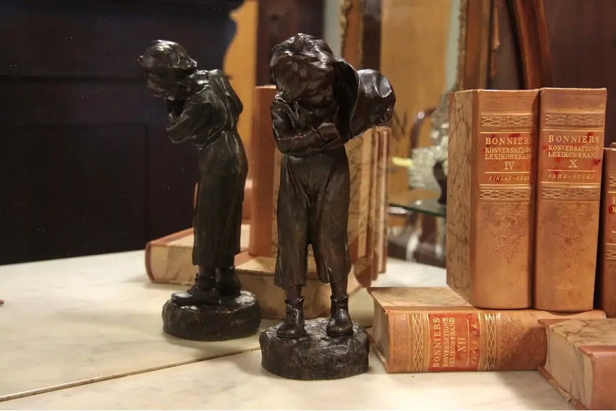 Photo of Bronze Sculpture of Boy Lighting Cigarette, Bofill
