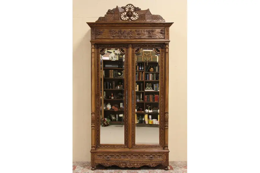 Photo of Brittany Carved Antique Chestnut 1900 Armoire with Folk Scene