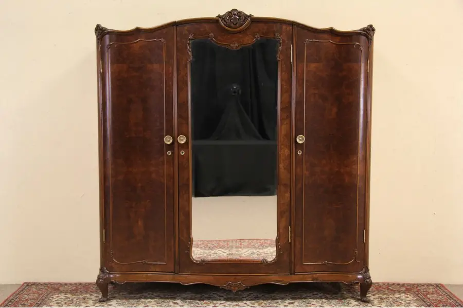 Photo of Italian Antique 1920 Carved Triple Armoire or Wardrobe, Beveled Mirror