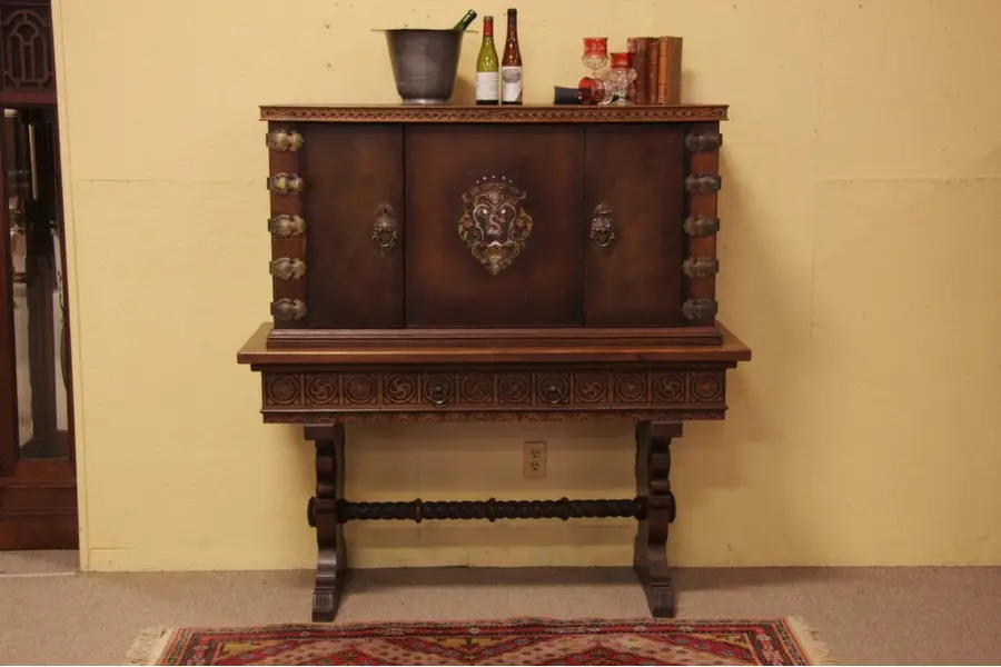 Photo of Oak China or Bar Cabinet w Tooled Leather Circa 1925