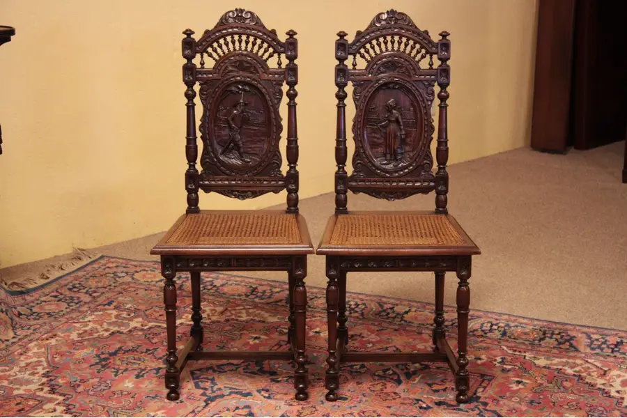 Photo of Pair of French Brittany Chairs, Carved Scenes