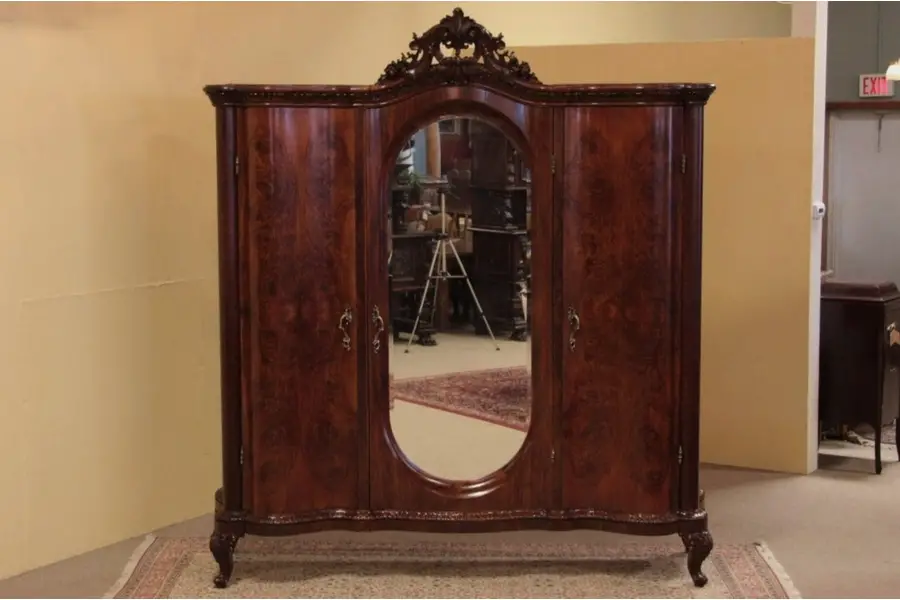 Photo of Carved Walnut Triple Armoire, Oval Beveled Mirror