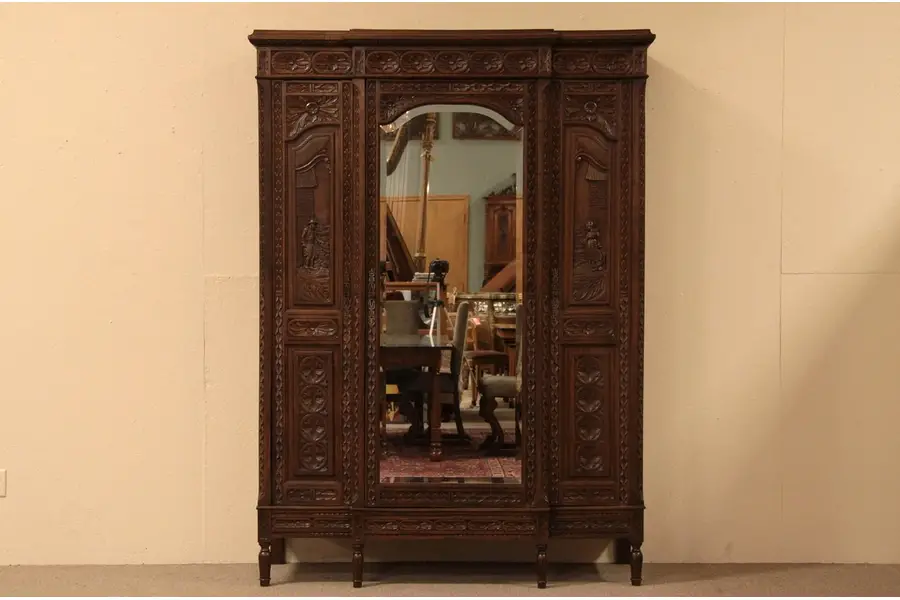 Photo of Brittany Carved Antique Triple Armoire with Mirror