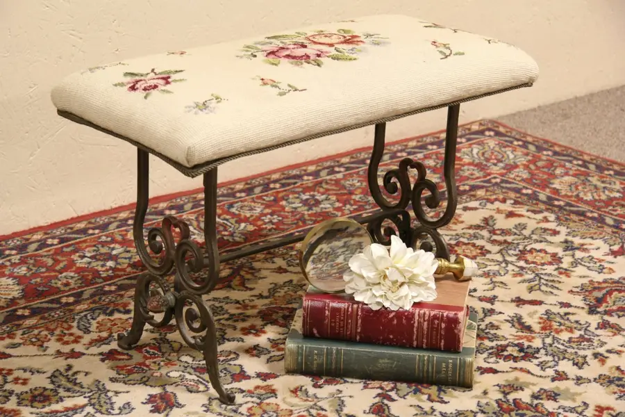 Photo of Upholstered Antique Iron Stool or Bench