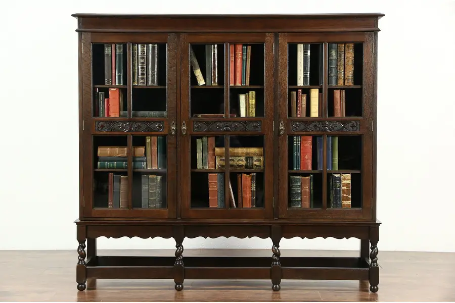 Photo of English Tudor 1915 Antique Carved Oak Triple Library Bookcase, Spiral Legs