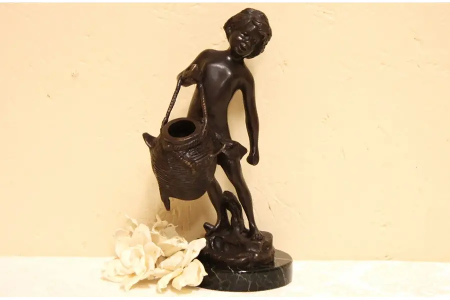 Photo of Bronze Sculpture Boy & Basket