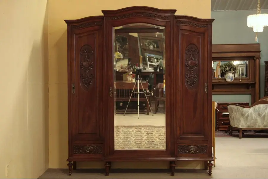 Photo of Triple Antique Carved Armoire, Beveled Mirror
