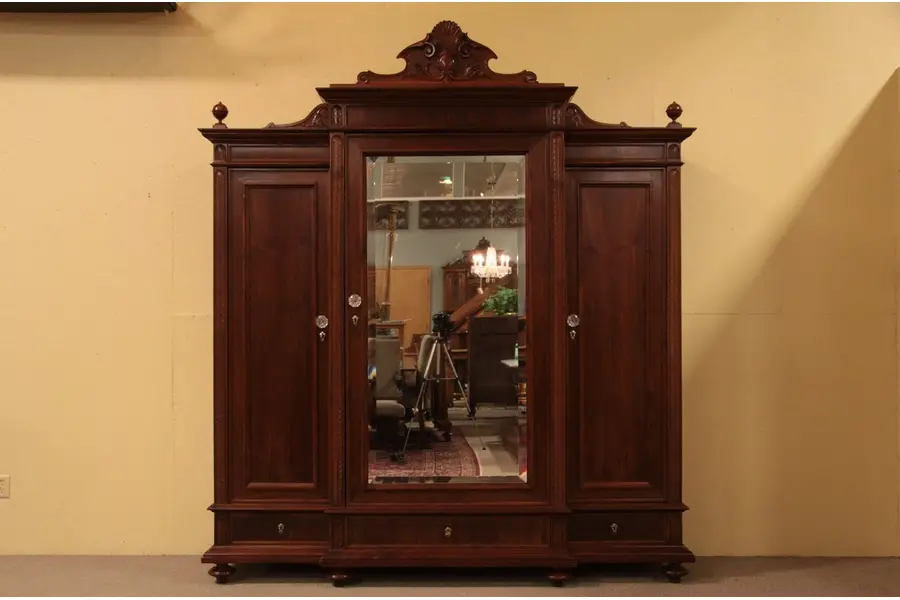 Photo of Victorian Carved Triple Armoire, Mirror Door