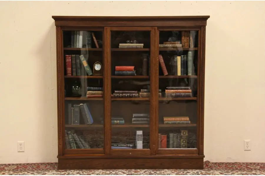 Photo of Oak 1900 Antique Bookcase, 3 Sliding Wavy Glass Doors