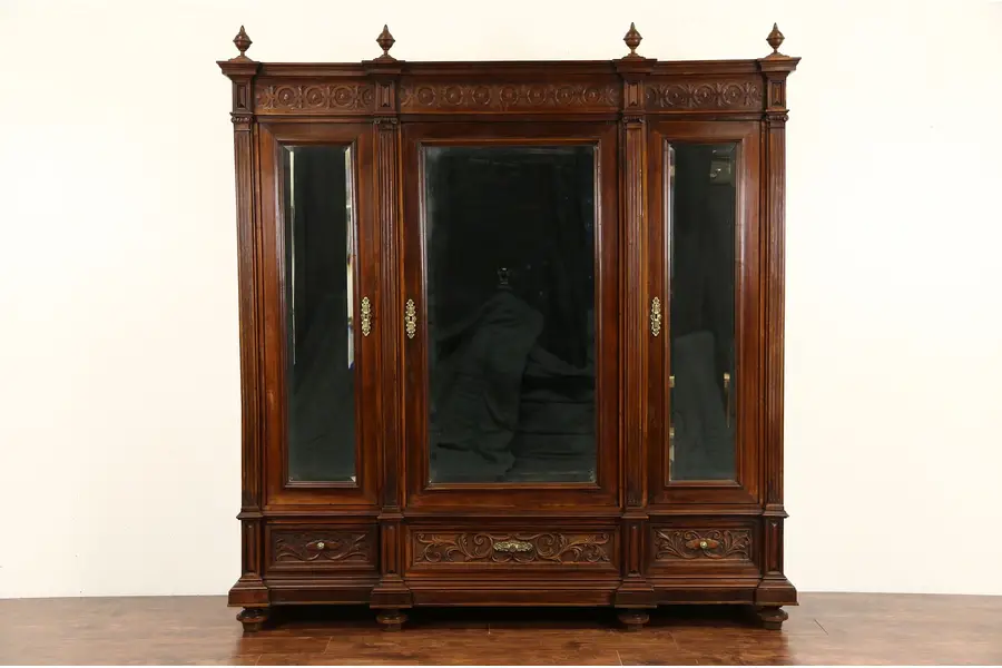 Photo of Italian Antique 1900 Renaissance Carved Walnut Triple Armoire, Bevel Glass Doors