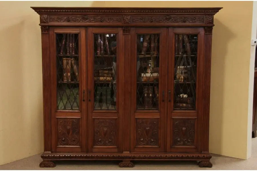 Photo of Carved Antique Bookcase, Iron Grills, Glass Doors