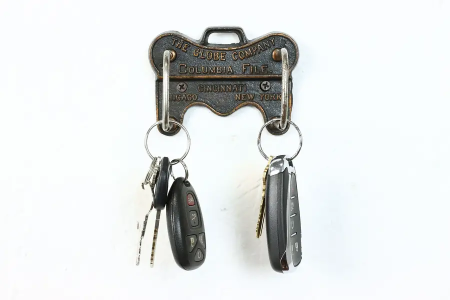 Photo of Victorian Industrial Antique Iron Wall Key Hook or File Pusher, Globe