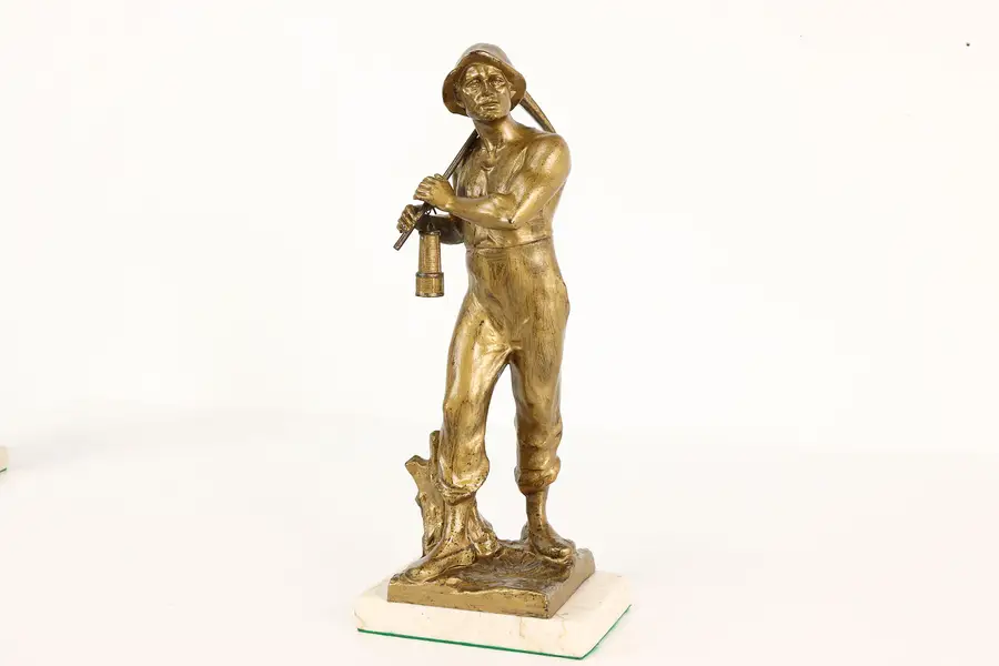 Photo of Miner with Pickaxe Statue Antique German Sculpture on Marble Base