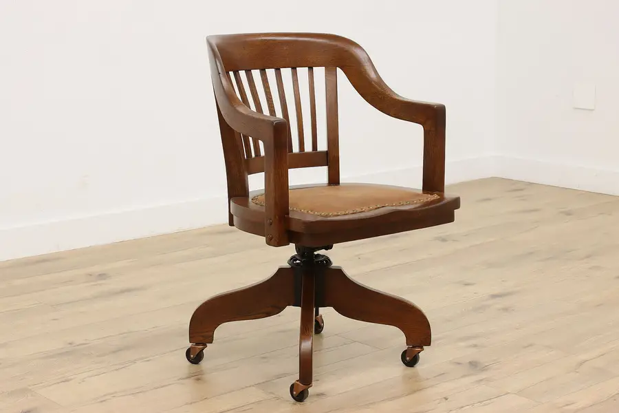 Photo of Gunlocke Antique Oak Swivel & Adjustable Desk Chair