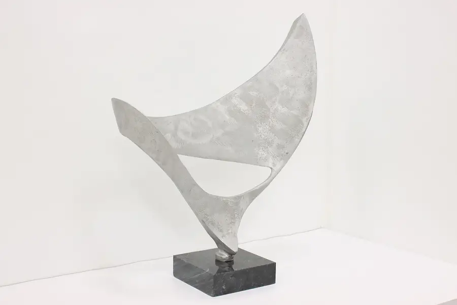 Photo of Aluminum Industrial Whale Tail Sculpture on Granite Base