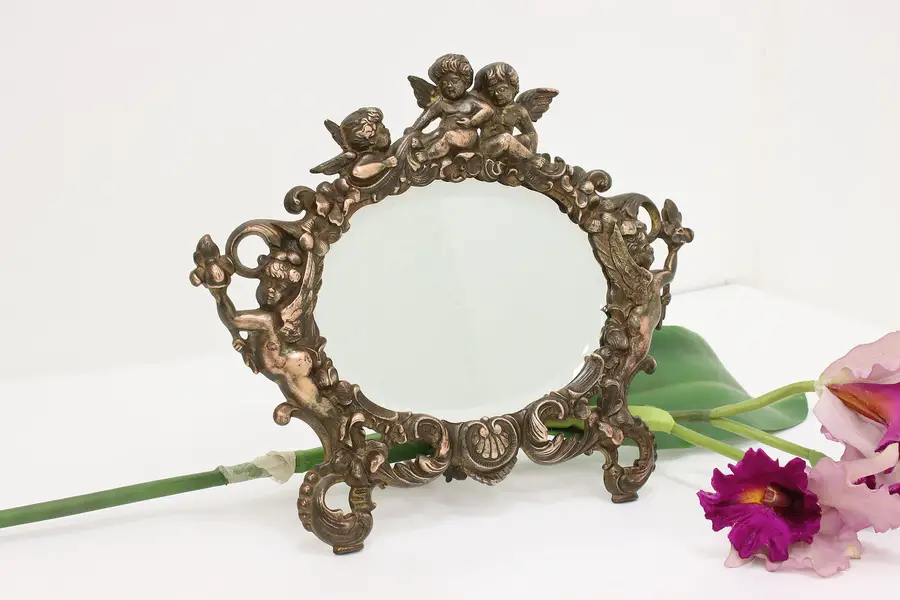 Photo of Victorian Antique Copper Tabletop Cherub Vanity Mirror