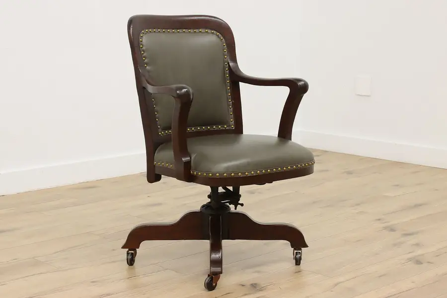 Photo of Victorian Antique Carved Oak Leather Swivel Chair Milwaukee