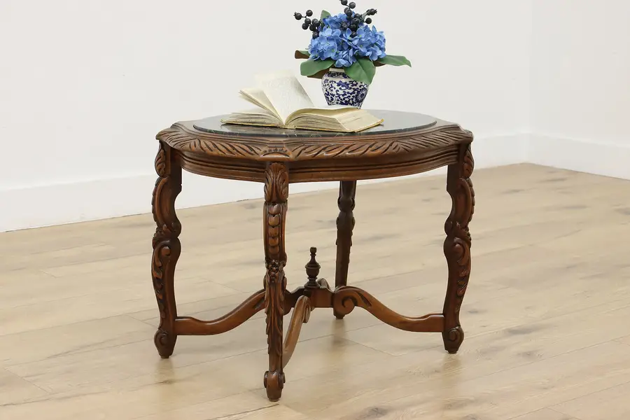 Photo of Oval Vintage Carved Walnut & Black Marble Coffee Table