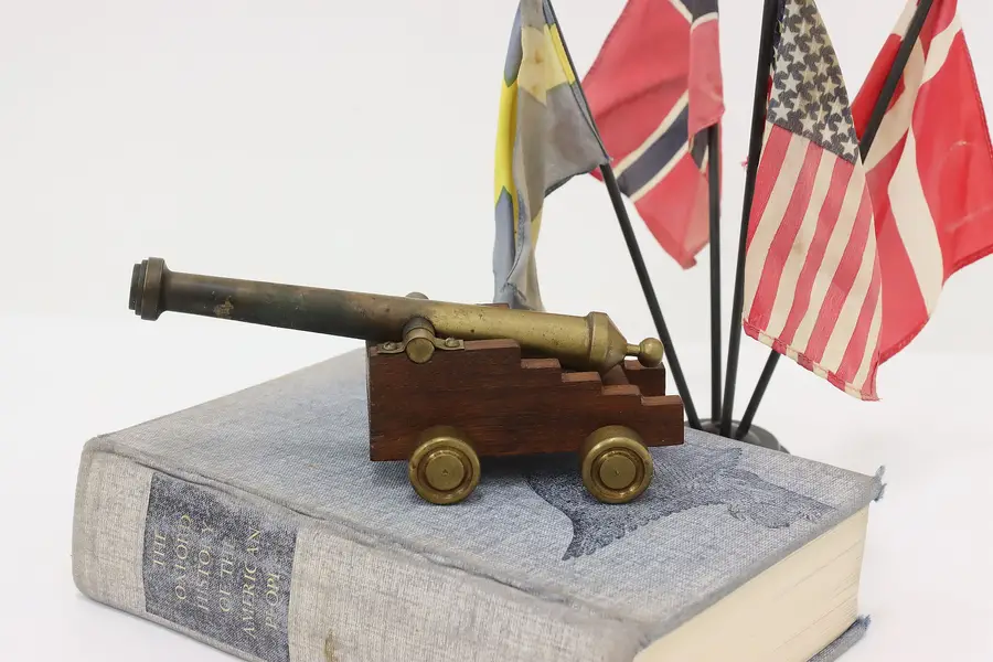 Photo of Desktop Antique Miniature Brass Cannon on Mahogany Base