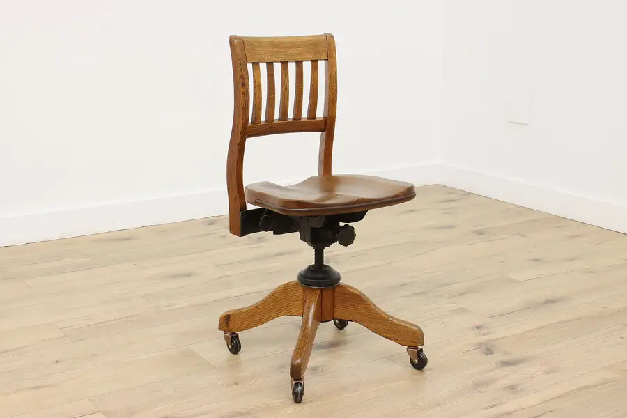 Photo of Swivel Oak Antique Adjustable Office Desk Chair